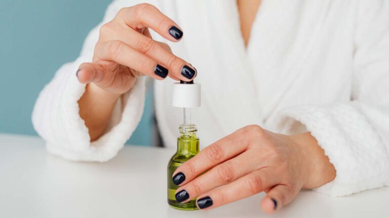 a woman with anti-aging body oils